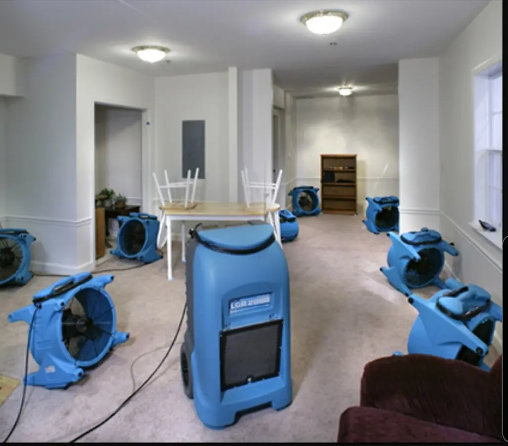 Air movers and dehumidifier setup for Water Damage Restoration in Laurel